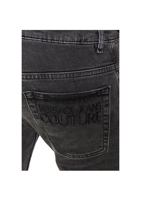 Cigarette jeans with black embossed logo VERSACE JEANS COUTURE | Jeans | 71GAB5D4 CDW07909
